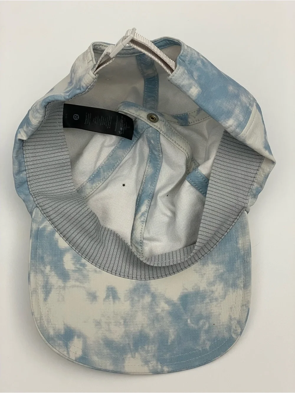 lululemon light blue washed cap with white interior